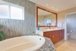 The large soaking tub is the ideal place to relax at the end of the day